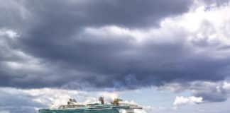The 5 People Who Need to Buy Cruise Insurance A cruise ship in a stormy port