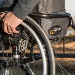 The Complete Guide to Cruising With a Disability Man sitting in a wheelchair