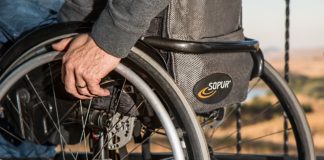 The Complete Guide to Cruising With a Disability Man sitting in a wheelchair