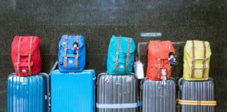 14 Things to Remember to Pack for an Alaskan Cruise Luggage sitting at the airport