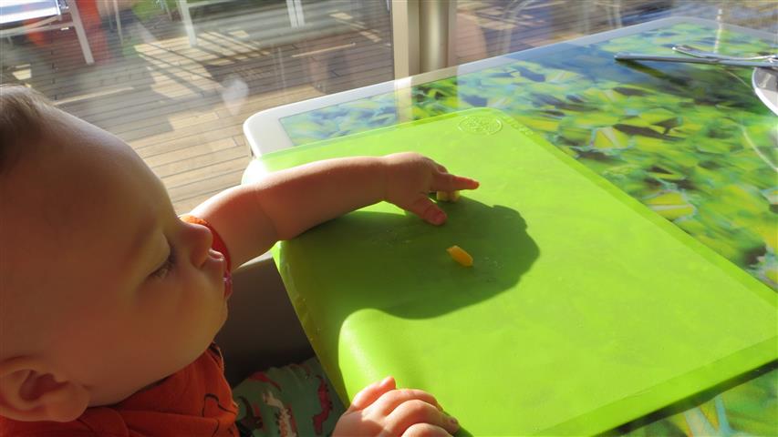 Child eating from placemat