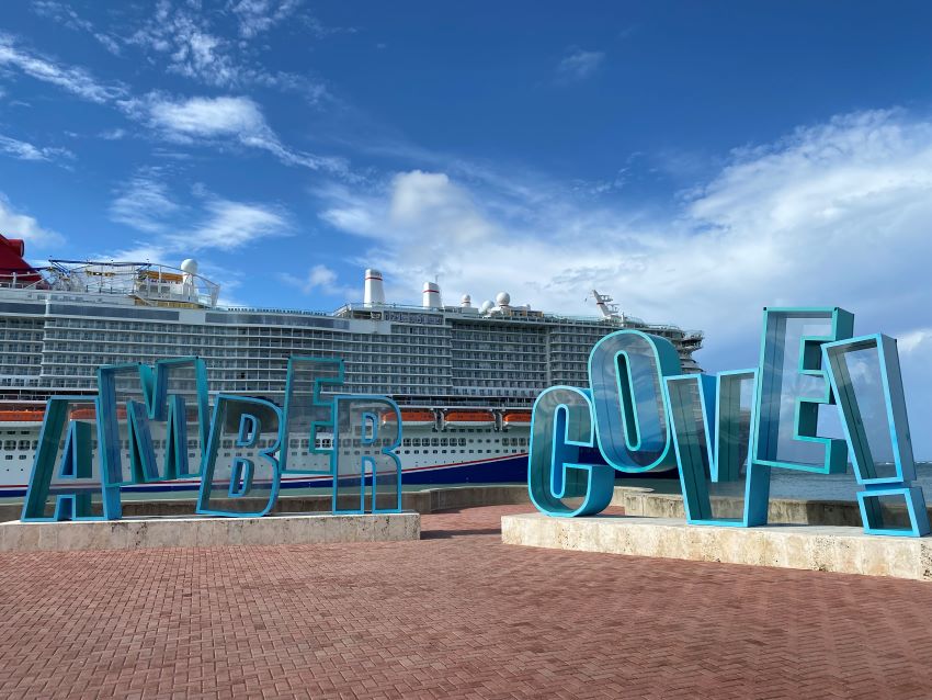 Sign in front of ship at Amber Cove