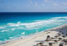 11 Beachfront Cancun Hotels with Childcare or Babysitting View of beach and water in Cancun from hotel
