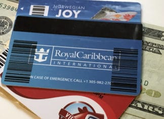 Everything About Cruise Ship Gratuities for 2026 (Amounts, Etiquette, and More) Ship keycard on top of cash money