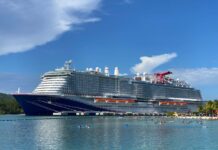 Complete Guide to Sailing Carnival Cruise Line (What It’s Like) Carnival Celebration docked in Roatan, Honduras