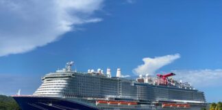 Complete Guide to Sailing Carnival Cruise Line (What It’s Like) Carnival Celebration docked in Roatan, Honduras