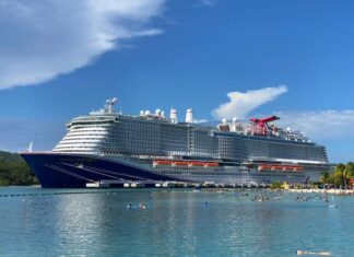Complete Guide to Sailing Carnival Cruise Line (What It’s Like) Carnival Celebration docked in Roatan, Honduras