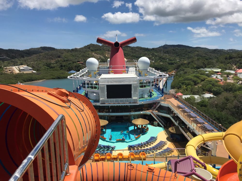 Pool deck and waterslide on a Carnival cruise ship