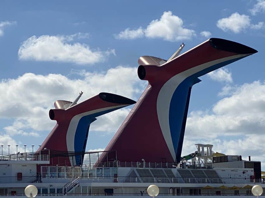 Carnival cruise ship funnels in sunlight.