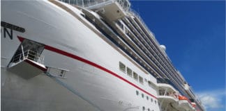 Carnival Cancelled My Cruise… And Gave Me Back More Money Than I Expected Broadside view of Carnival ship in port