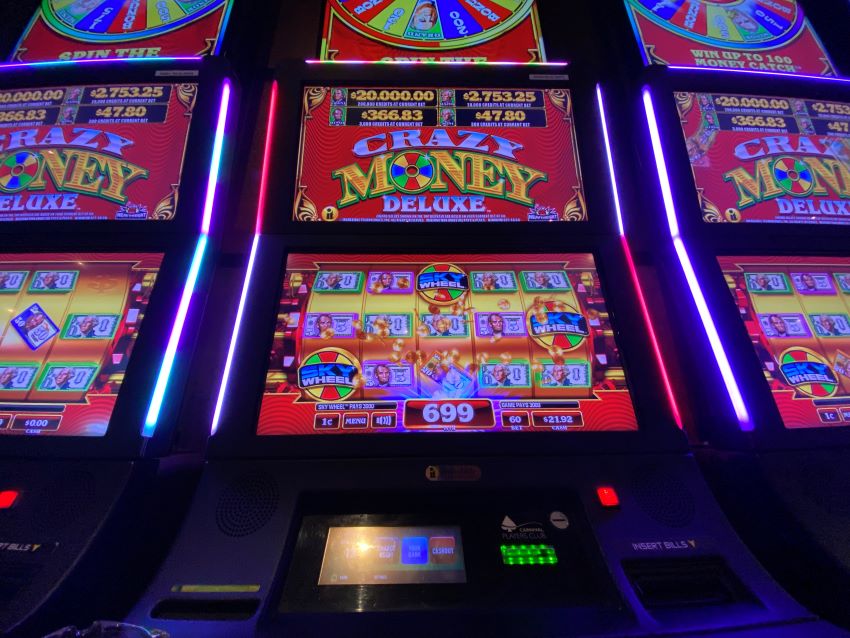 Slot machine with casino win