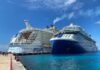 12 Big Differences Between Celebrity Cruises and Royal Caribbean Royal Caribbean and Celebrity cruise ships docked next to each other.