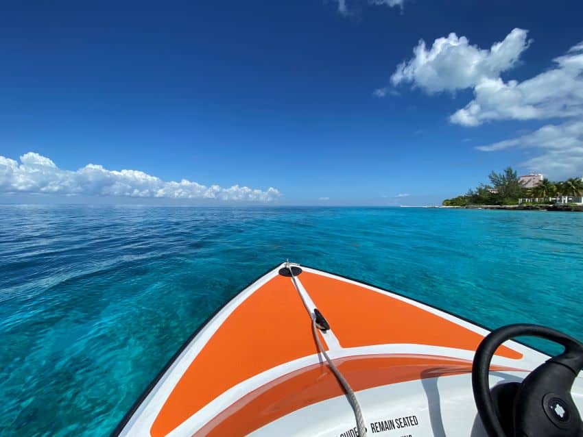 Small boat in blue water for a cruise shore excursion