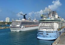 The Best Cruise Lines for Kids & Families Carnival ship passing a Royal Caribbean ship in Miami