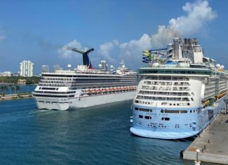 The Best Cruise Lines for Kids & Families Carnival ship passing a Royal Caribbean ship in Miami