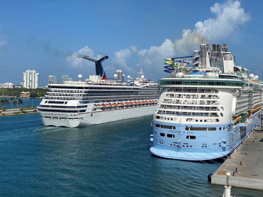 Carnival ship passing a Royal Caribbean ship in Miami
