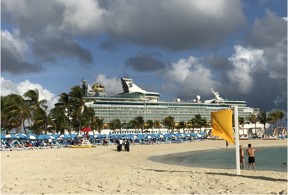 Cruise ship docked at island