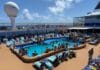 Elbow Room: List of Cruise Ships Ranked By Space Per Passenger (Find Your Ship) Cruise passengers on a busy pool deck