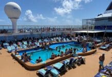 Elbow Room: List of Cruise Ships Ranked By Space Per Passenger (Find Your Ship) Cruise passengers on a busy pool deck