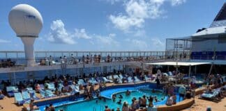 Elbow Room: List of Cruise Ships Ranked By Space Per Passenger (Find Your Ship) Cruise passengers on a busy pool deck
