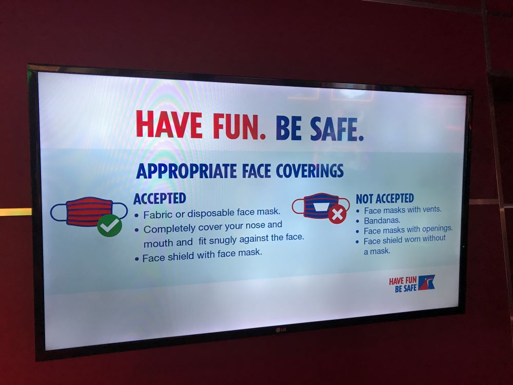 Sign on cruise ship regarding face masks