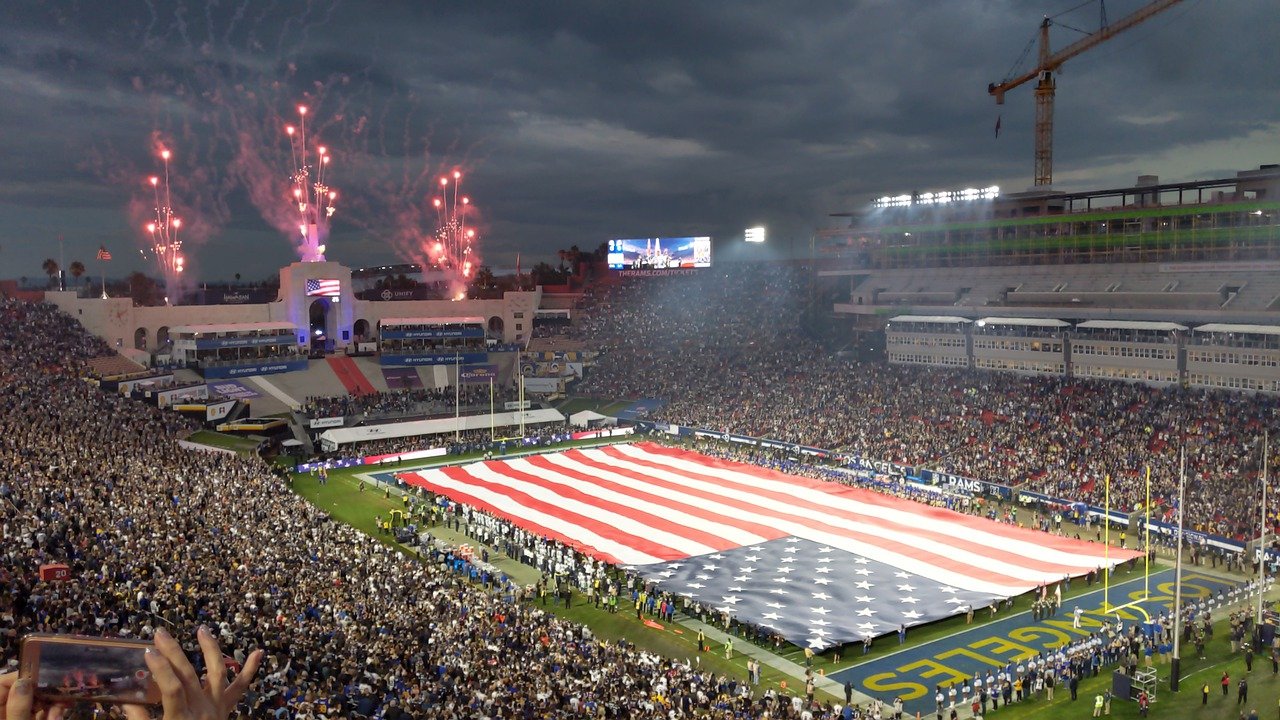 Football stadium packed before a game.