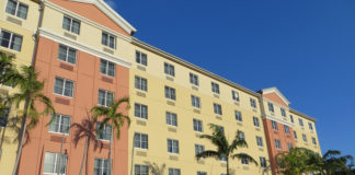 Hotels With Cruise Shuttles For Every Major Port in America Hotel facade in sunlight