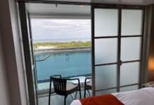 Infinite Balconies on a Cruise: Pros, Cons, and Should You Book? An infinite balcony room with one door closed.