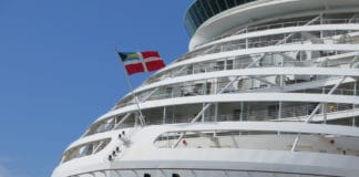 Why Do Cruise Ships Sail Under Foreign Flags? Bahamian Flag flying on Mariner of the Seas
