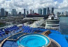 Which Cruise Line Has the Cheapest Cruises from Miami? View of the Miami skyline with cruise ships in the foreground