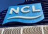 Reviewed: Everything about NCL Cruise Internet (Speed, Discounts, and More) Logo of NCL on a cruise ship