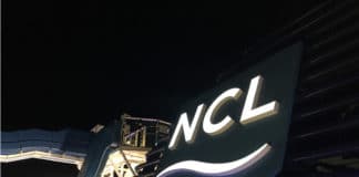 More Cruises Canceled: Norwegian, Royal Caribbean, & Carnival Suspend Sailings Until March Norwegian Cruise Lines sign at night