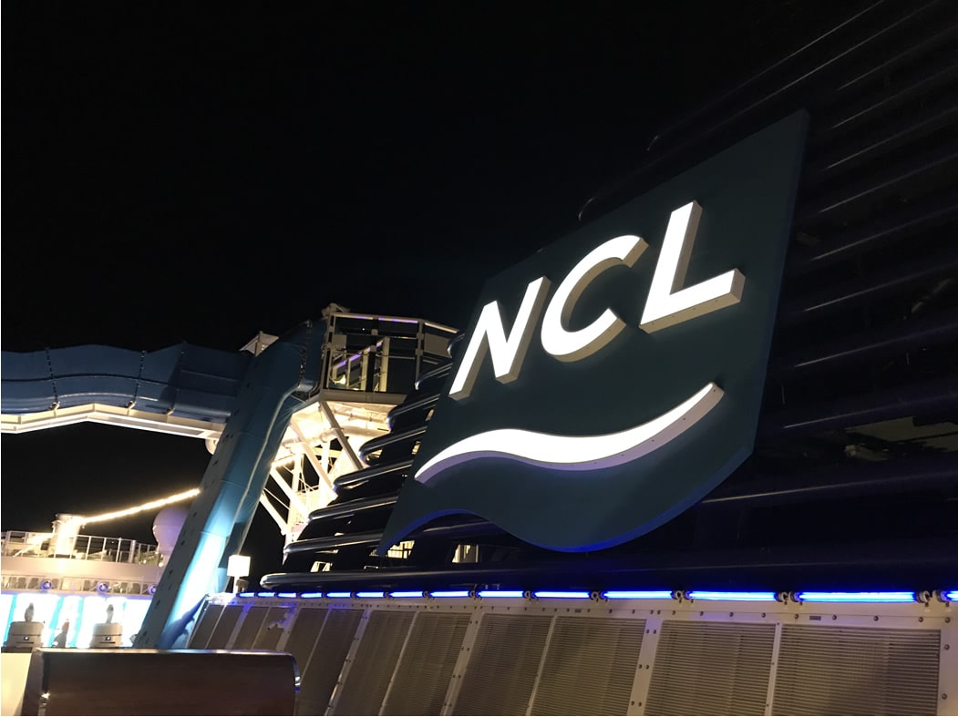 Norwegian Cruise Lines sign at night