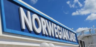 Norwegian Cruise Lines Suspends Cruises Through October Norwegian Jade sign