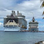 9 BIG Differences of Sailing a Large vs. Small(er) Cruise Ship Old cruise ship docked next to a new one