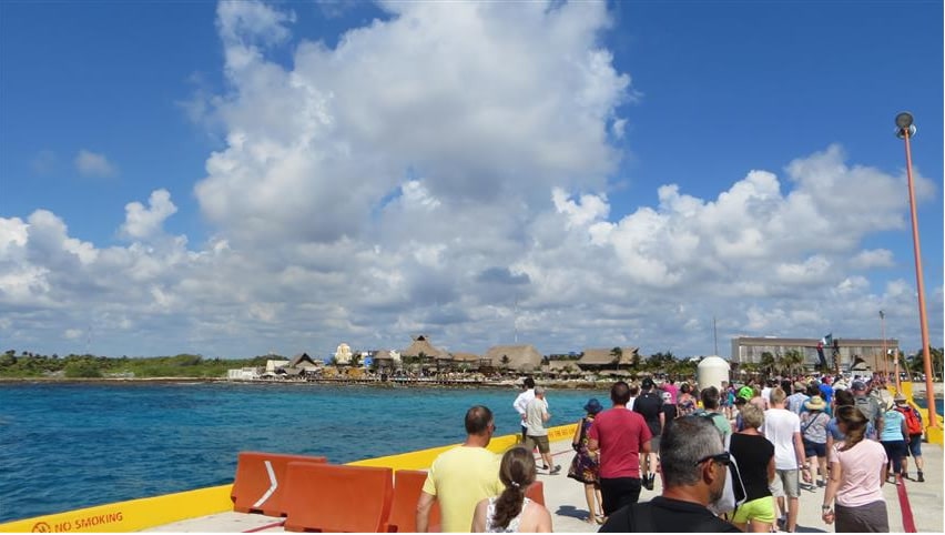 Passengers walking into port