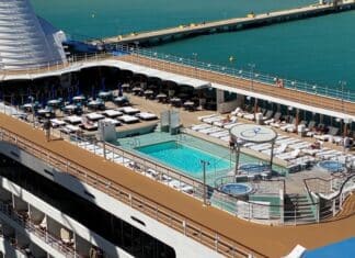 Staying on a Cruise Ship in Port: What to Know Before You Stay An empty pool deck while a ship is docked in port.