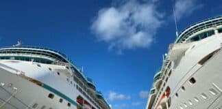 Why Cheap Cruises Are Dead (For Right Now) Royal Caribbean ships in port in Nassau