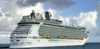 Complete Guide to Sailing Royal Caribbean (What It’s Like) Royal Caribbean ship ported in CocoCay