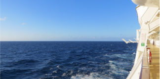 CONFIRMED Cruise Changes to Keep Passengers Healthy (Including Onboard Testing) View from cruise ship sailing at sea