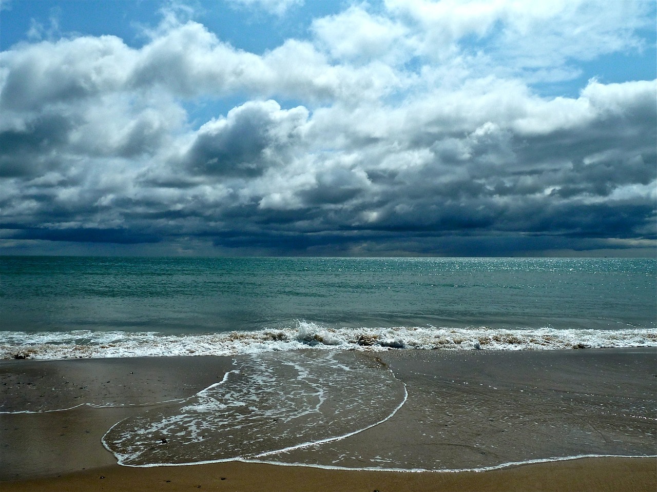 Stormy beach and sea