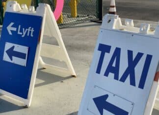 5 Easy Ways to Get to the Los Angeles and Long Beach Cruise Ports Taxi and Lyft sign at Los Angeles airport