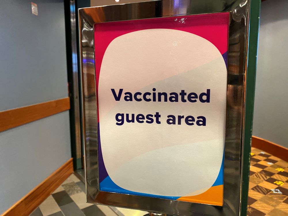 Sign for vaccinated guests on a cruise