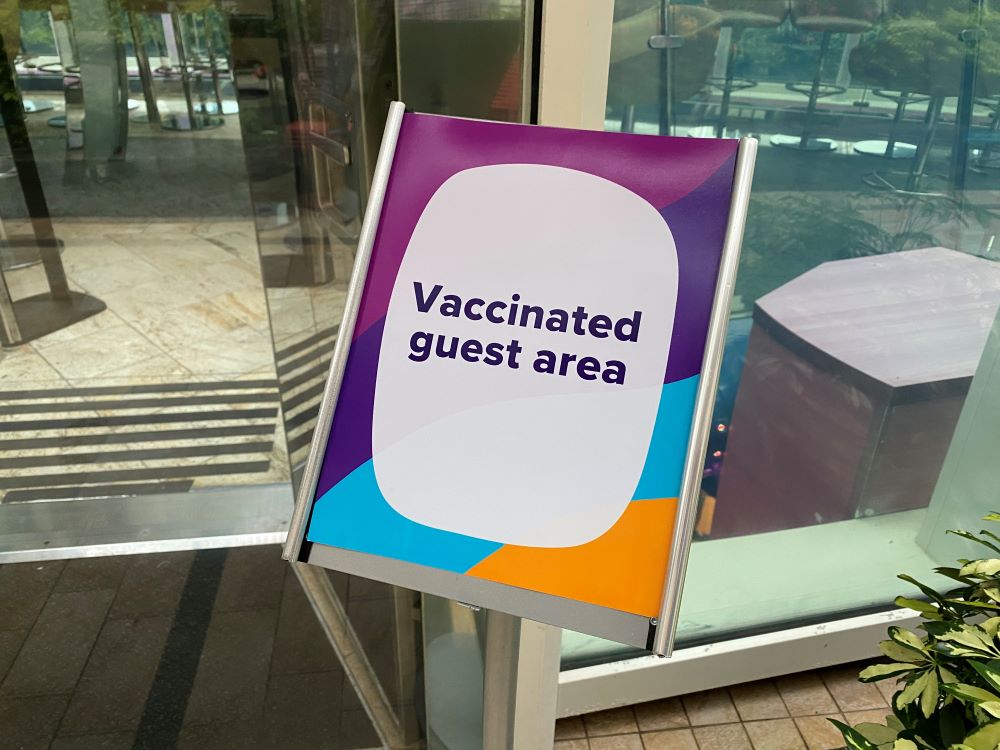 Vaccinated guest area sign